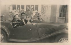 Young Couple in Convertible Car Studio Portrait Postcard