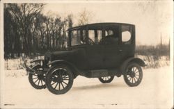 Man Driving Early Car in Snow, Winter Scene Postcard