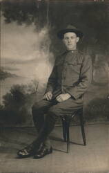 WWI Soldier in Uniform Studio Portrait Postcard