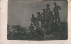 Group of Men on Farm Machinery Postcard