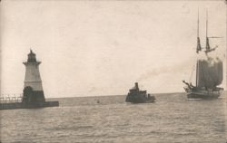 Sodus Point Lighthouse with Tugboat and Schooner Postcard