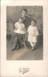 Mother with Two Children, Studio Portrait Postcard