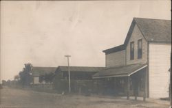 Street Scene, Hasty, MN - Buildings & Utility Pole Postcard