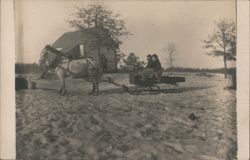 Two Women on Horse-drawn Sleigh in Snowy Landscape Postcard