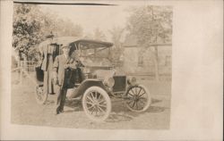 Man & Woman with Ford Model T Automobile, License 32659 Postcard