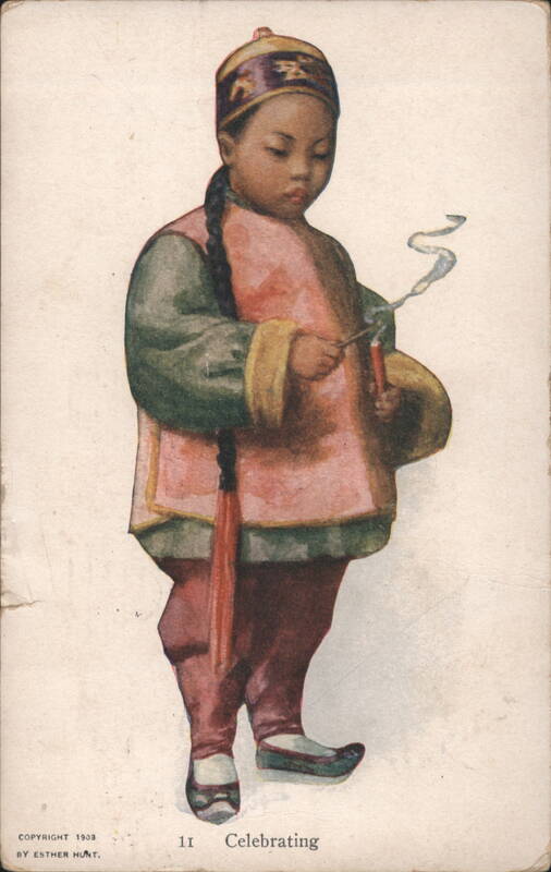 Chinese Child in Traditional Attire Lighting Firecracker