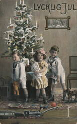Swedish LYCKLIG JUL Greeting with Children, Christmas Tree & Toys Postcard