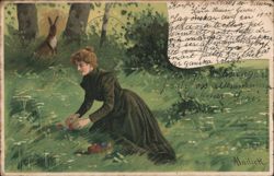 Woman Collecting Easter Eggs in Field, Rabbit in Background Postcard