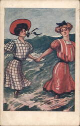 Two Women Holding Hands in the Ocean Surf Postcard