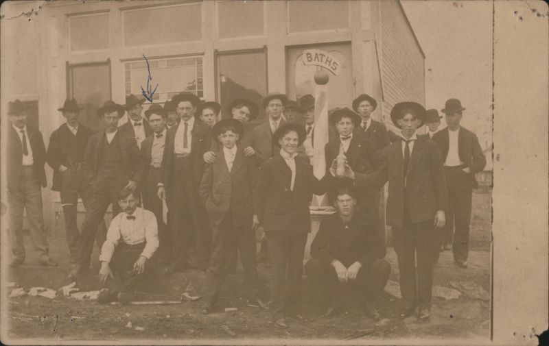 Group of Men Outside Barber Shop & Baths Storefront