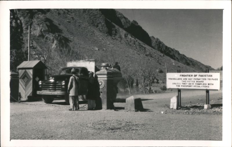 Frontier of Pakistan Sign at Border Checkpoint with Truck