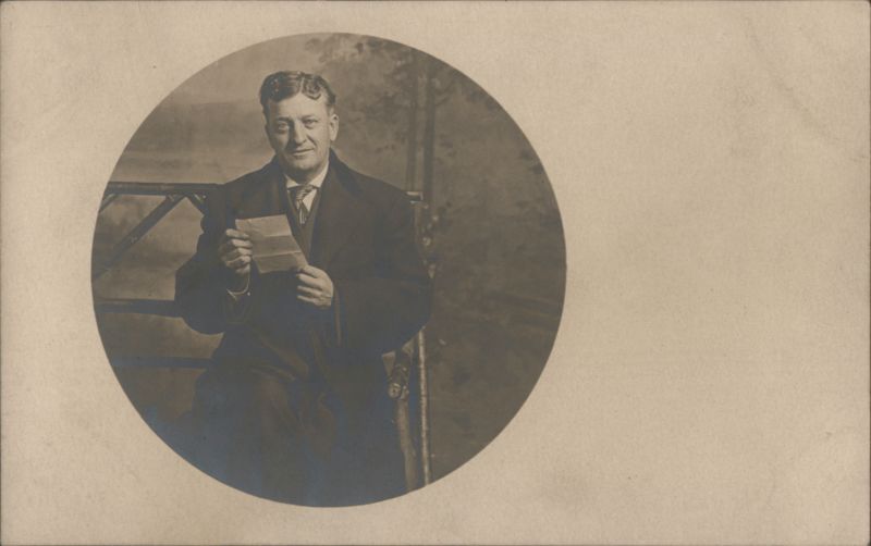 Man Seated with Letter, Alaska-Yukon-Pacific Expo 1909