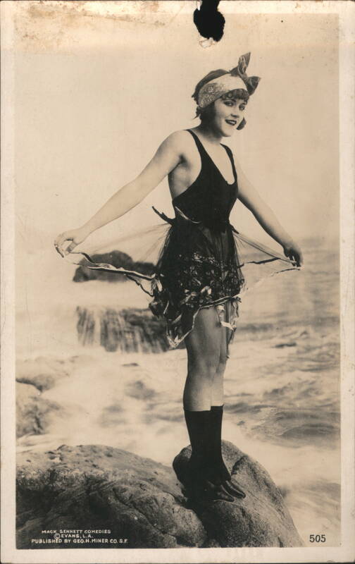 Mack Sennett Bathing Beauty, Ruffled Swimsuit on Rock