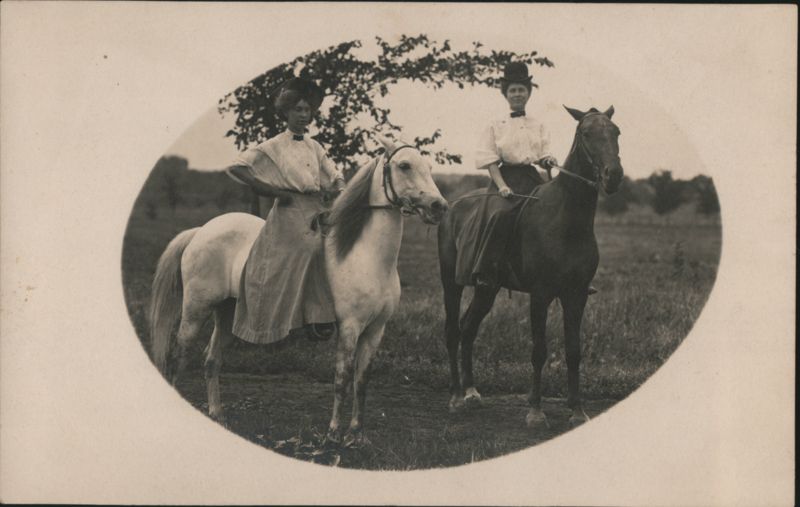 Two Women Horseback Riding Side by Side Outdoors Horses