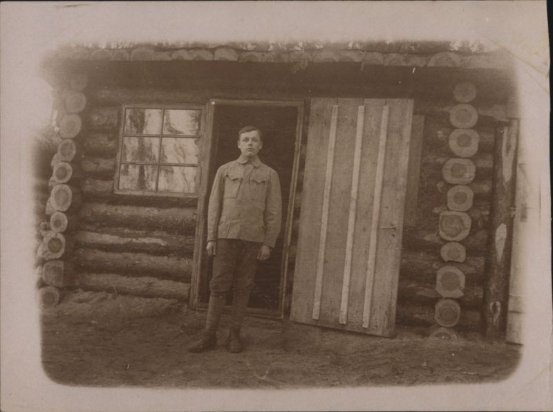 WWI Soldier Michal Halko Outside Log Cabin, Bolotury 1916