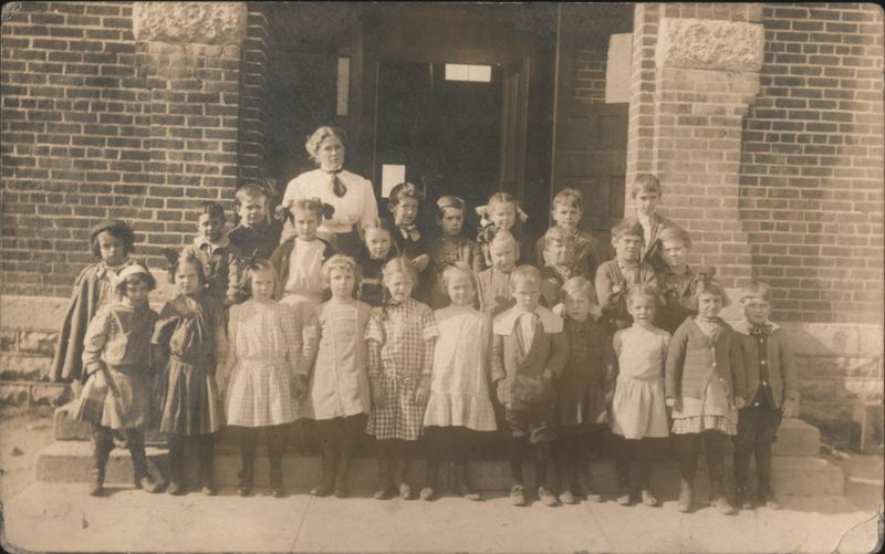 School Children and Teacher Group Portrait on Brick Steps