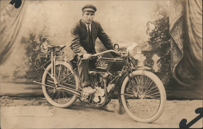 Man in Suit on Early Thor Motorcycle Studio Portrait