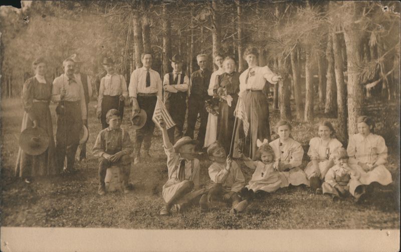 Group Portrait in Pine Grove with American Flags Family Portaits
