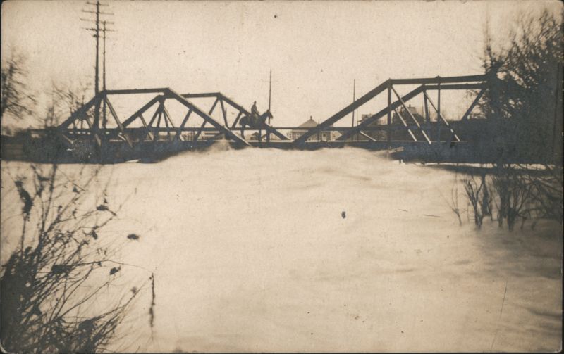 Steel Truss Bridge Over Turbulent River with Horse Rider