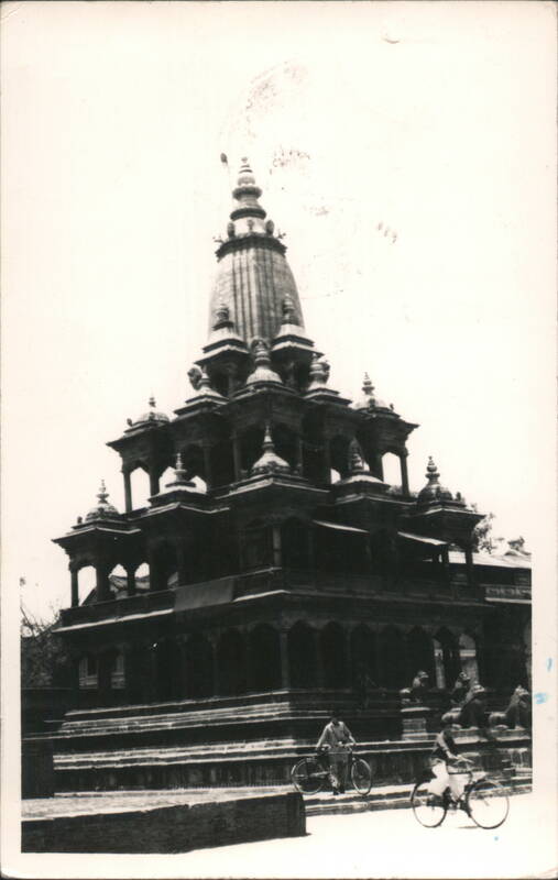Krishna Mandir Temple Stone Architecture with Cyclists Kathmandu Nepal