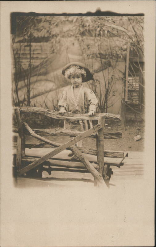 Curly-Haired Child in Hat Standing on Rustic Wooden Bench