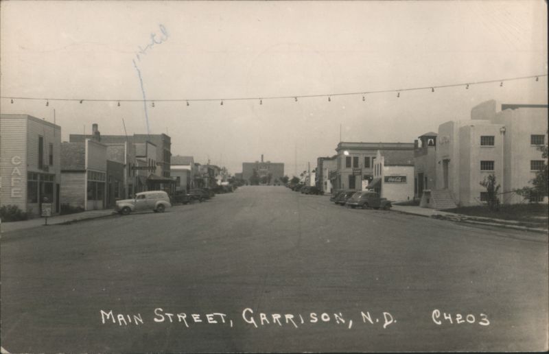 Main Street View with Vintage Cars and Storefronts Garrison North Dakota