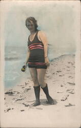 Woman in 1920s Swimsuit & Stockings on Beach Hand Tinted Postcard