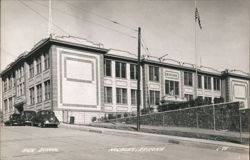 Nogales High School Building Exterior with Vintage Cars Postcard