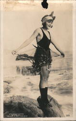 Mack Sennett Bathing Beauty, Ruffled Swimsuit on Rock Postcard