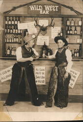 Staged Wild West Bar Saloon Scene Two Cowboys Woolly Chaps Postcard