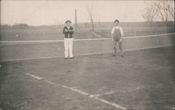 Two Men on Rural Dirt Tennis Court with Rackets Postcard