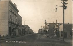 Main Street Scene, Grand Theater Sign, Dirt Road Postcard