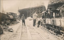 Railroad Crew with Steam Locomotives & Timber Structure Postcard