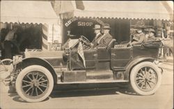 Group in Touring Car with Selma Pennant at Shoe Repair Shop Postcard
