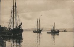 Three-Masted Schooners and Steam Tugboat in Harbor Postcard