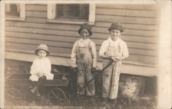 Three Children with Toy Wagon, Boys in Overalls Postcard