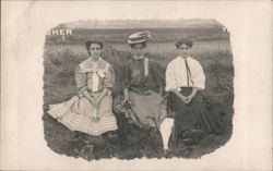 Three Young Women Seated on Grass Edwardian Fashion Postcard