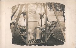 Two Women Seated on Wooden Garden Swing, Edwardian Fashion Postcard