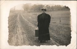 Woman Traveler with Suitcase on Rural Dirt Road Postcard