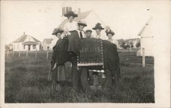 Group Posing on Advertising Elephant Prop The Leader Store Postcard