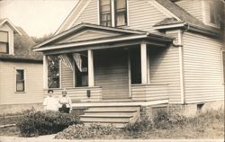 Two Women Outside House with American Flags & Red Cross Sign Postcard