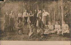 Group Portrait in Pine Grove with American Flags Postcard