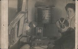 Early Amateur Radio Station Operator with Headphones & Woman Postcard