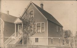 Pomey Bros. Carpenters & Builders House, Family on Steps Postcard