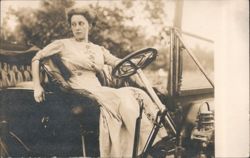 Victorian Woman Sitting Behind Steering Wheel of Car Postcard