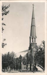 St. Olaf Lutheran Church with Tall Steeple Postcard
