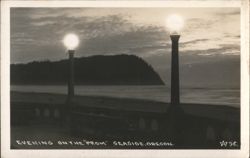 Evening on the Prom, Seaside, Oregon - Lit Street Lamps Postcard