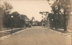 Brick Paved Street Scene with Vintage Auto Postcard