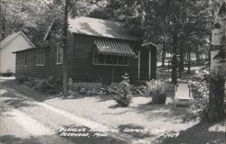 Blomen's Resort Log Cabin on Serpent Lake Postcard