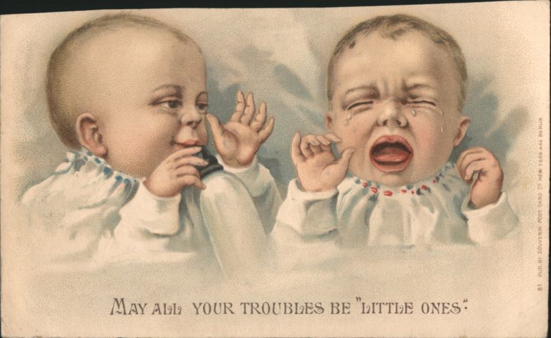Crying and Smiling Babies with 'May All Your Troubles Be Little Ones' Saying